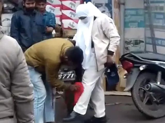 On Camera, Policewoman Forces Man To Clean Her Trousers