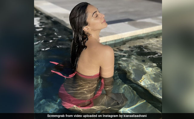 Kiara Advani Charms Us With A Splash In The Pool In Her Pink Swimwear