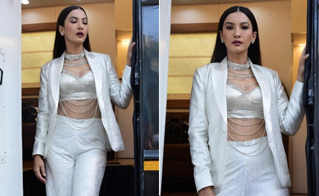 Gauahar Khan Is All Glammed Up In A White Pantsuit And A Bedazzled Infinity Necklace