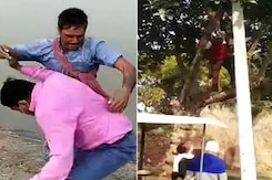 Watch: UP Man Wrestles Official, Another Climbs Tree To Dodge Covid Shot Watch: UP Man Wrestles Official, Another Climbs Tree To Dodge Covid Shot