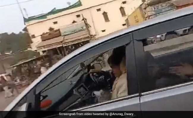 Watch: BJP Leader, Seen Without  Mask, Throws One Away When Given