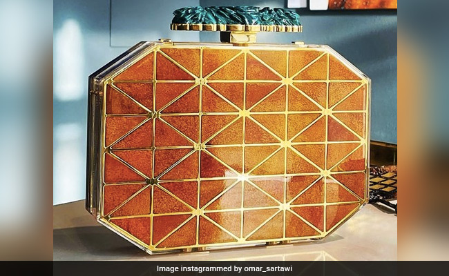 संतरे के छिलकों से फूड आर्टिस्ट ने बनाया Luxury Handbag, देखकर आपको भी नहीं होगा यकीन