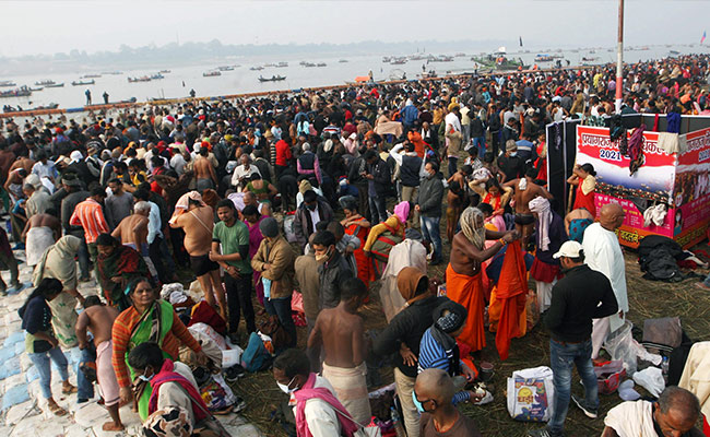 Lakhs Take Holy Dip In Ganga In UP On Makar Sankranti, Defy Covid Surge