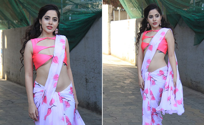 Urfi Javed Continues Showing Her Love For Cutouts, This Time With A <i>Saree</i>