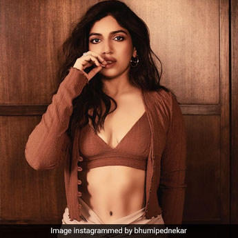 Bhumi Pednekar Embraces Winter Warmth In A Brown Bralette And Beige Wrap Skirt
