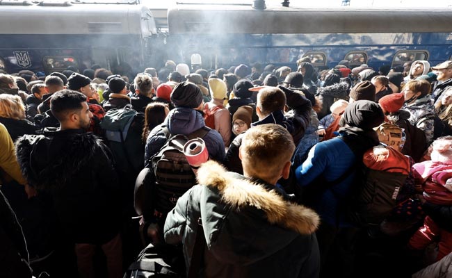 Shots Fired As Ukrainians Try To Cram Onto Evacuation Trains