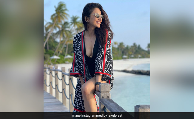 Just Rakul Preet Singh Living Her "Island Life" In A Stylish Black Swimsuit And Printed Coverup