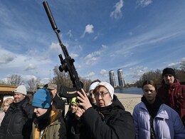 "This Way I'm Less Afraid": Ukraine Citizens Pick Up Guns To Defend Nation "This Way I'm Less Afraid": Ukraine Citizens Pick Up Guns To Defend Nation