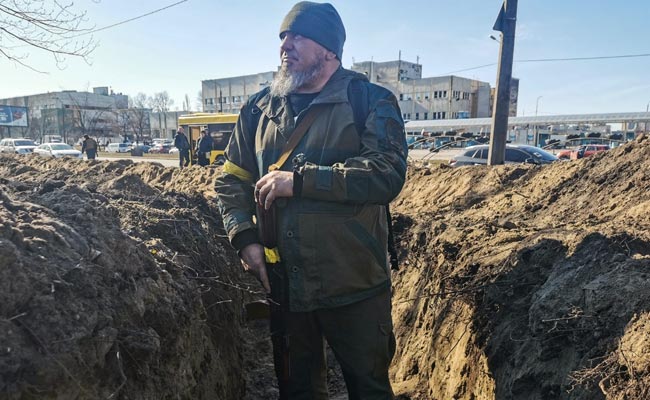 Trenches And Molotov Cocktails: Kyiv Digs In For War