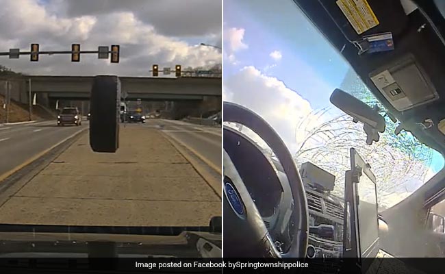 तेज रफ्तार गाड़ी का पहिया निकलकर पुलिस की कार से टकराया, देखिए कैसे बची पुलिसवालों की जान