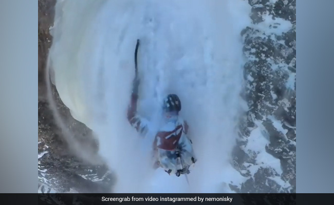 Watch: Man Clings To Mountainside During Avalanche In Hair-Raising Video