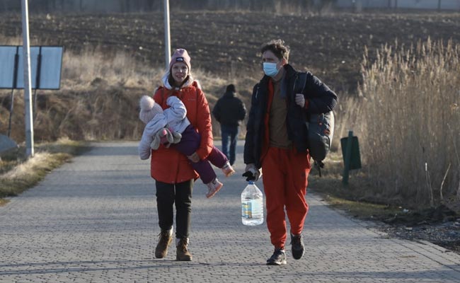 "Didn't Expect This": In Ukraine Capital, Some Save Supplies, Others Run