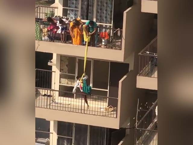 Woman Dangles Son By Saree From 10th Floor To Fetch Fallen Clothes