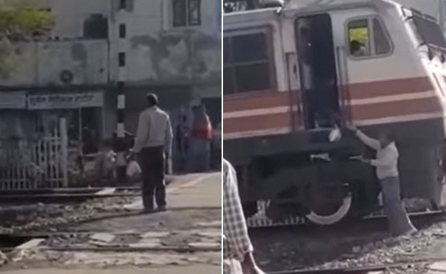 कचौड़ी खाने के चक्कर में लोकोपायलट ने बीच फाटक पर रोक दी ट्रेन, वायरल वीडियो देख चकरा गए लोग