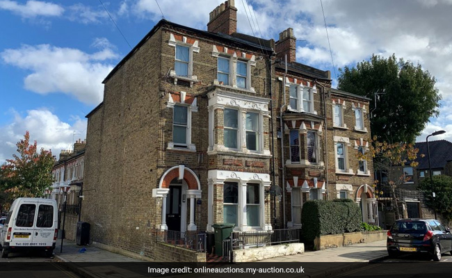 Tiny London Apartment With Bed Over Microwave Sells for $122,000