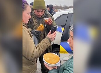 Watch: Crying Russian Soldier Gets Tea And Food From Ukrainians