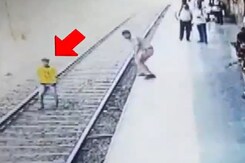 Thane Cop Rescues Teen Who Jumped Infront Of Moving Train Thane Cop Rescues Teen Who Jumped Infront Of Moving Train