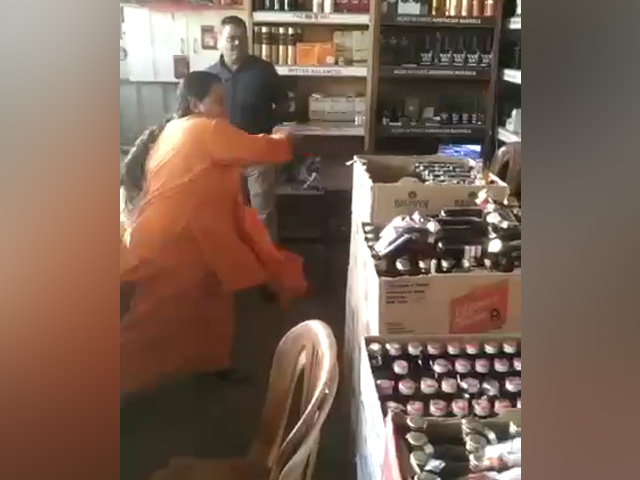 Ex-Union Minister Uma Bharti Vandalises Liquor Shop