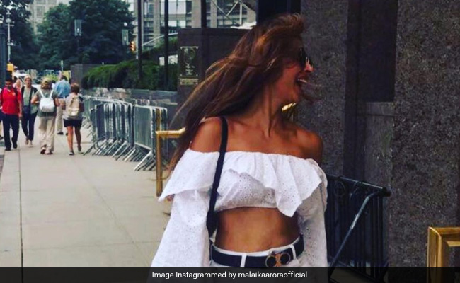 "Summer Is Officially Here" For Malaika Arora In A White Crop Top And Shorts