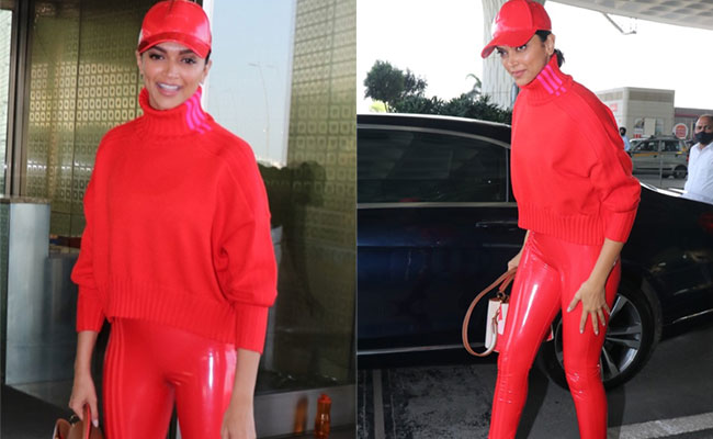 Deepika Padukone Paints The Town Red With Her Colour Block Airport Look Complete With A Cap And Pumps