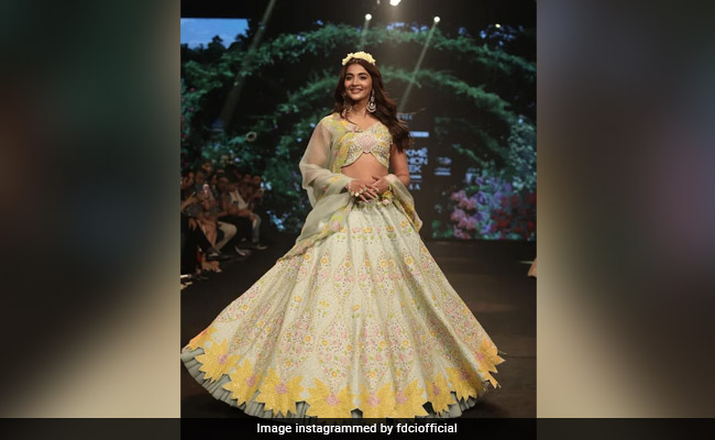 FDCI  X Lakme Fashion Week: Pooja Hegde Looks Summer Chic In A Stunning Pastel Lehenga