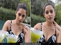 With Cocktails By The Pool, Nushrratt Bharuccha Is Summer Ready In Her Printed Black Swimsuit With Cocktails By The Pool, Nushrratt Bharuccha Is Summer Ready In Her Printed Black Swimsuit