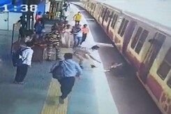 Man Slips Trying To Board Train, Alert Cop Saves Him Man Slips Trying To Board Train, Alert Cop Saves Him