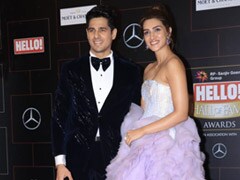 Viral: Sidharth Malhotra Holds Kriti Sann's Dress Up For Her