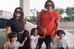 Sunny Leone Stuns In Black Outfit As She Poses With Family At Airport Sunny Leone Stuns In Black Outfit As She Poses With Family At Airport