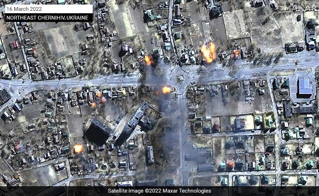 Satellite Pics: Bomb Crater In Olympic Stadium, Destroyed Homes In Ukraine