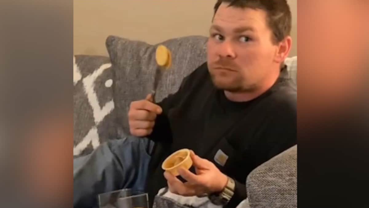 Talented! A unique way of eating peanut butter and biscuits together