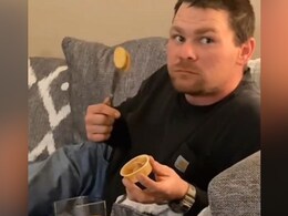 Genius! Man Reveals A Unique Trick To Eat Peanut Butter And Biscuit Together; Video Instantly Goes Viral