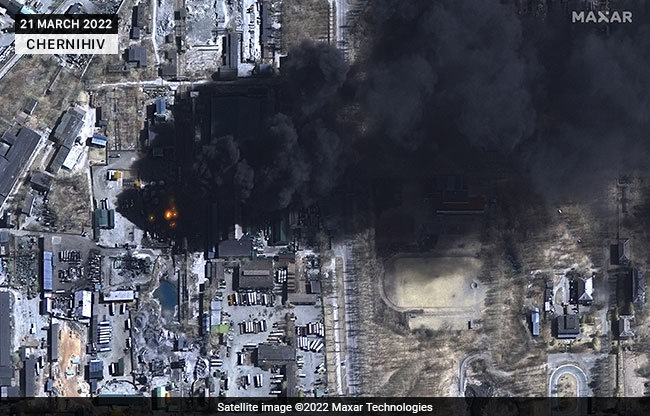 Latest Ukraine Satellite Pics Show Burning Apartments, Storage Tanks