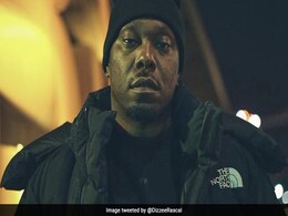 US Rapper Dizzee Rascal Guilty Of Assault Smashes Photographer's Camera Outside Court US Rapper Dizzee Rascal Guilty Of Assault Smashes Photographer's Camera Outside Court
