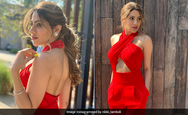 Nikki Tamboli Makes Traffic Signals Stop At Her Feet In Her Red Jumpsuit