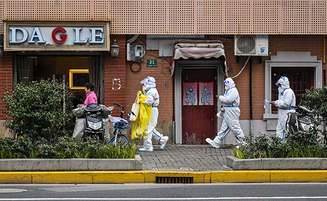 China's Shanghai To Impose Phased Lockdown To Curb Covid Outbreak