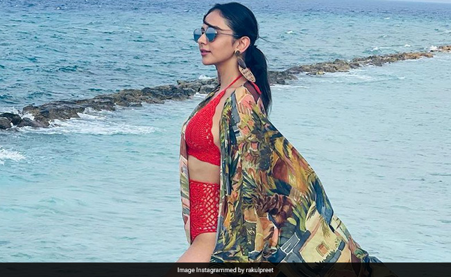 Rakul Preet Singh Rocks A Red Swimsuit With A Multicoloured Long Cape For A Beach Day In Maldives