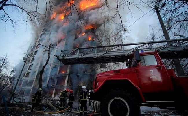 Kyiv High-Rise Apartment In Flames After Being Hit By Russian Shelling