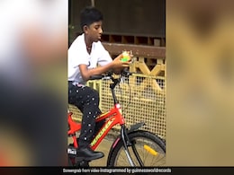 Chennai Boy Solves Rubik's Cube While Riding Bicycle, Sets World Record Chennai Boy Solves Rubik's Cube While Riding Bicycle, Sets World Record