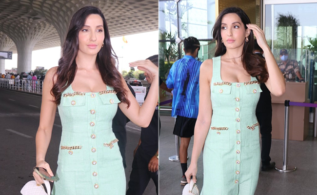 Nora Fatehi Travels Stylishly Well In A Mint Green Dress And A Rs 5.5 Lakh Handbag