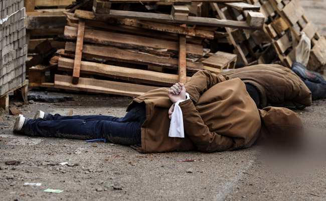 In Ukraine Street, Body With Hands Tied, A Bullet Wound To The Head