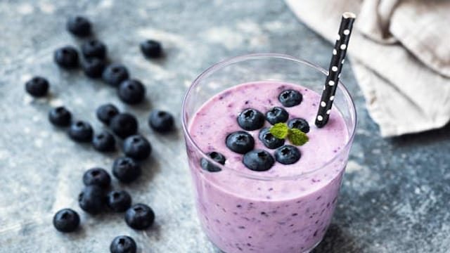 Prepare an antioxidant-rich protein shake by combining a banana and variety of berries