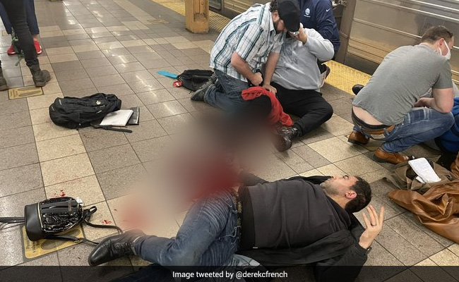 Brooklyn Subway Shooting Highlights: 10 Injured, Police Hunt For Shooter