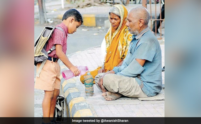 Viral Photo Of Boy Offering Water To Elderly Couple Leaves Internet Emotional