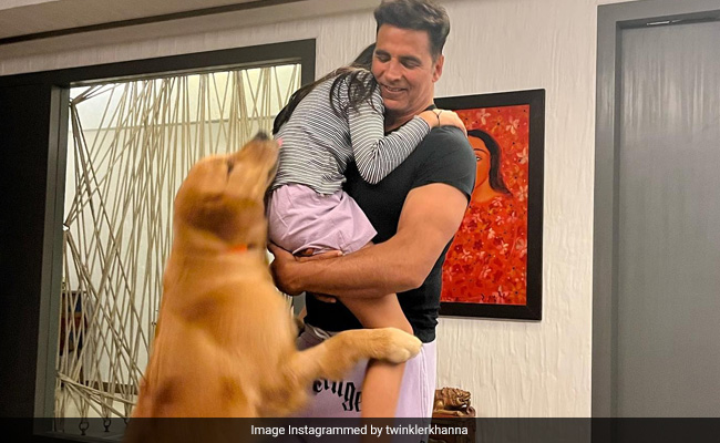 A Group Hug For Akshay Kumar, Daughter Nitara And, Umm, Dog. Thanks For The Pic, Twinkle Khanna