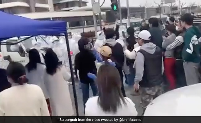 On Camera, Shanghai Residents Clash With Police Over Virus Policy