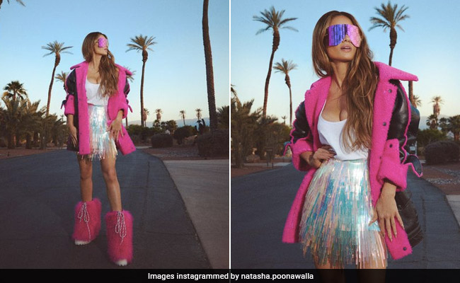 In A Holographic Skirt And Pink Boots, Natasha Poonawalla Is Set To Turn Heads At Coachella