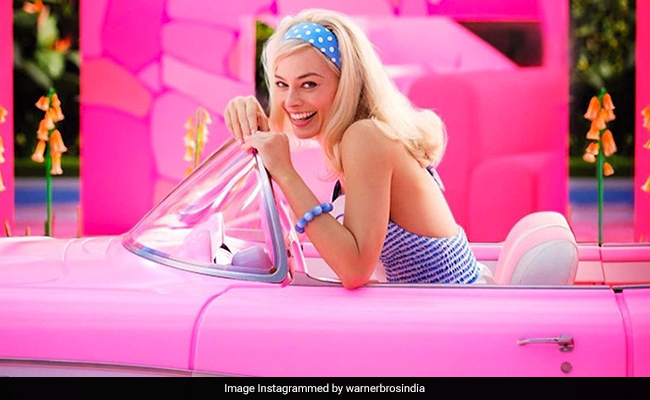 In A Polka Dot Hairband And Blonde Waves, Margot Robbie As <i>Barbie</i> Makes Us Say "Let's Go Party!"