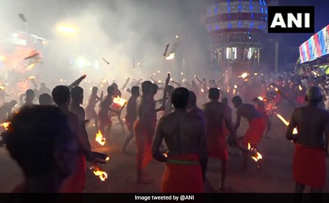 Watch: Devotees Hurl Balls Of Fire At Each Other In <i>Agni Kheli</i> Festival