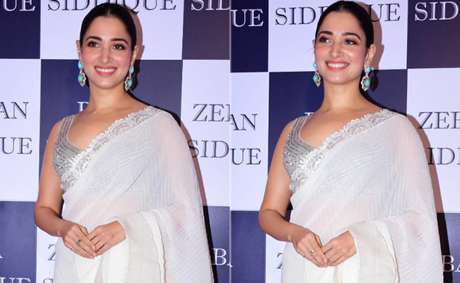 Tamannaah Bhatia Adds A Festive Touch To The Season In A Ruffled White <i>Saree</i>